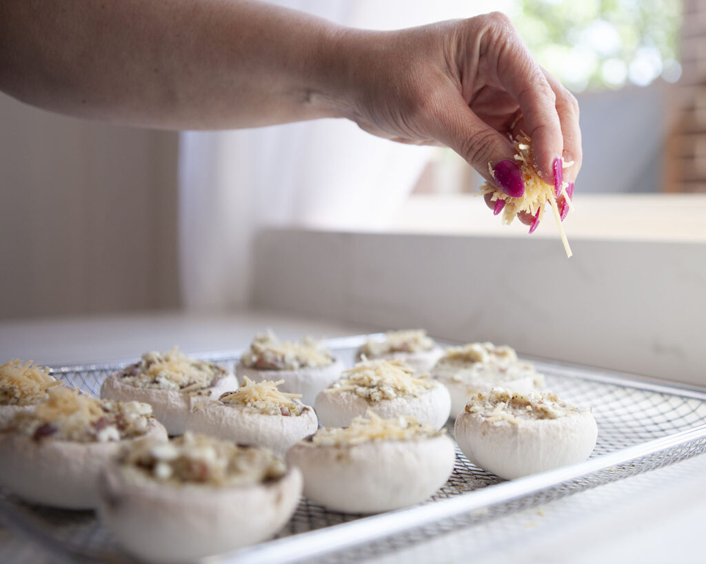 Cheese drizzles on the Mushroom Cups with Protein