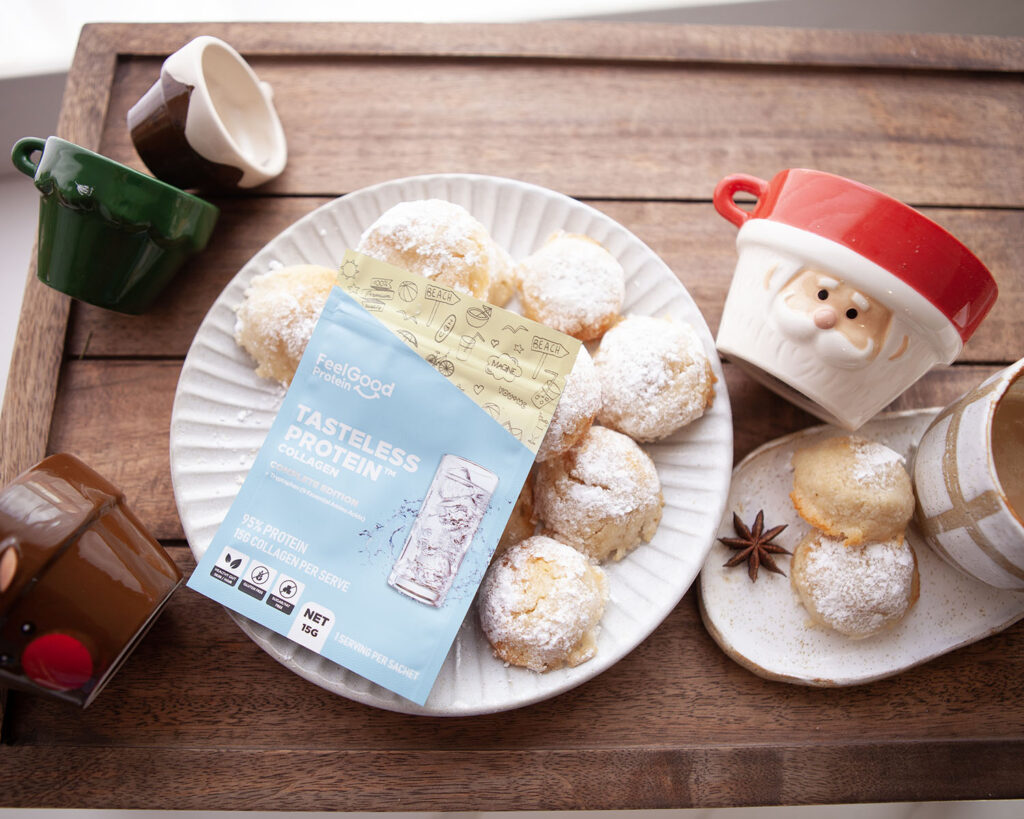 Almond Vanilla Protein Cookies with Tasteless Protein and Santa Cups on Table