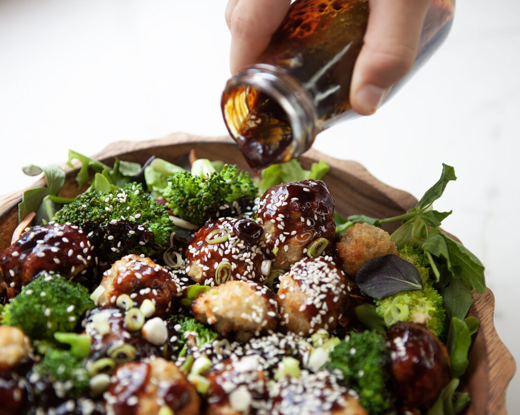 Teriyaki Sauce Poured on Chicken Balls