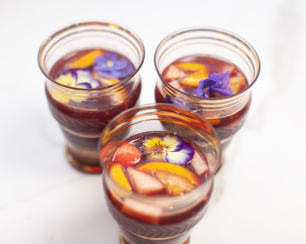 3 Cups containing the Non Alcoholic Sangria