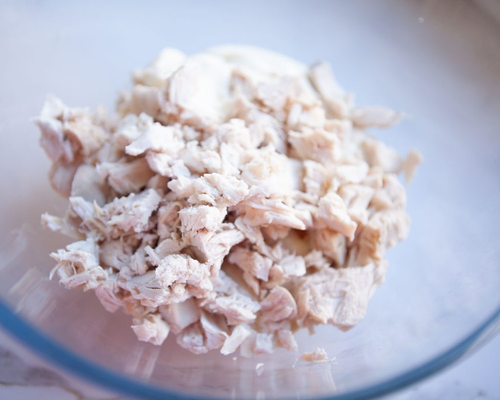 Shredded Chicken in Mixing Bowl