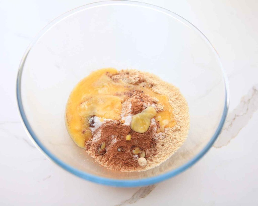 Wet and dry ingredients in a bowl 