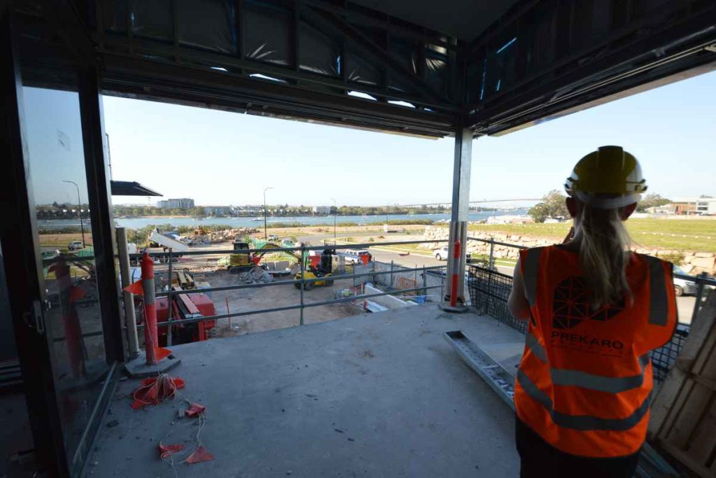 Jordan on the balcony at cps hq while the building is being built and fitted out