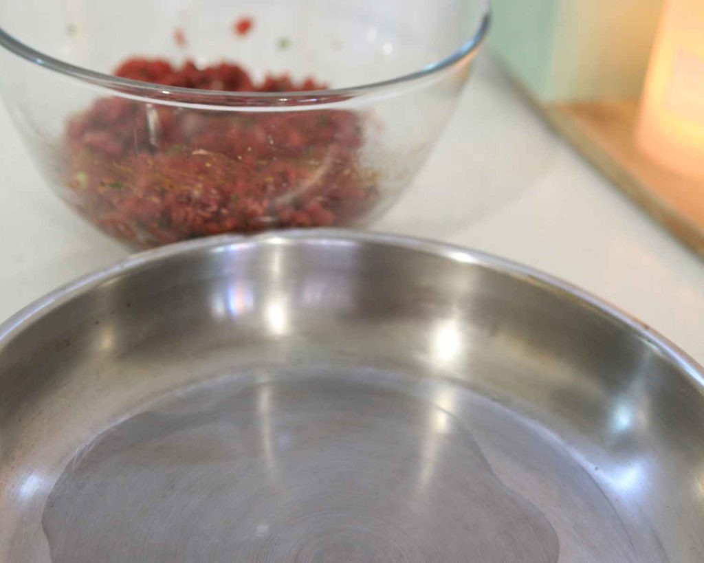Meatballs going into the pan