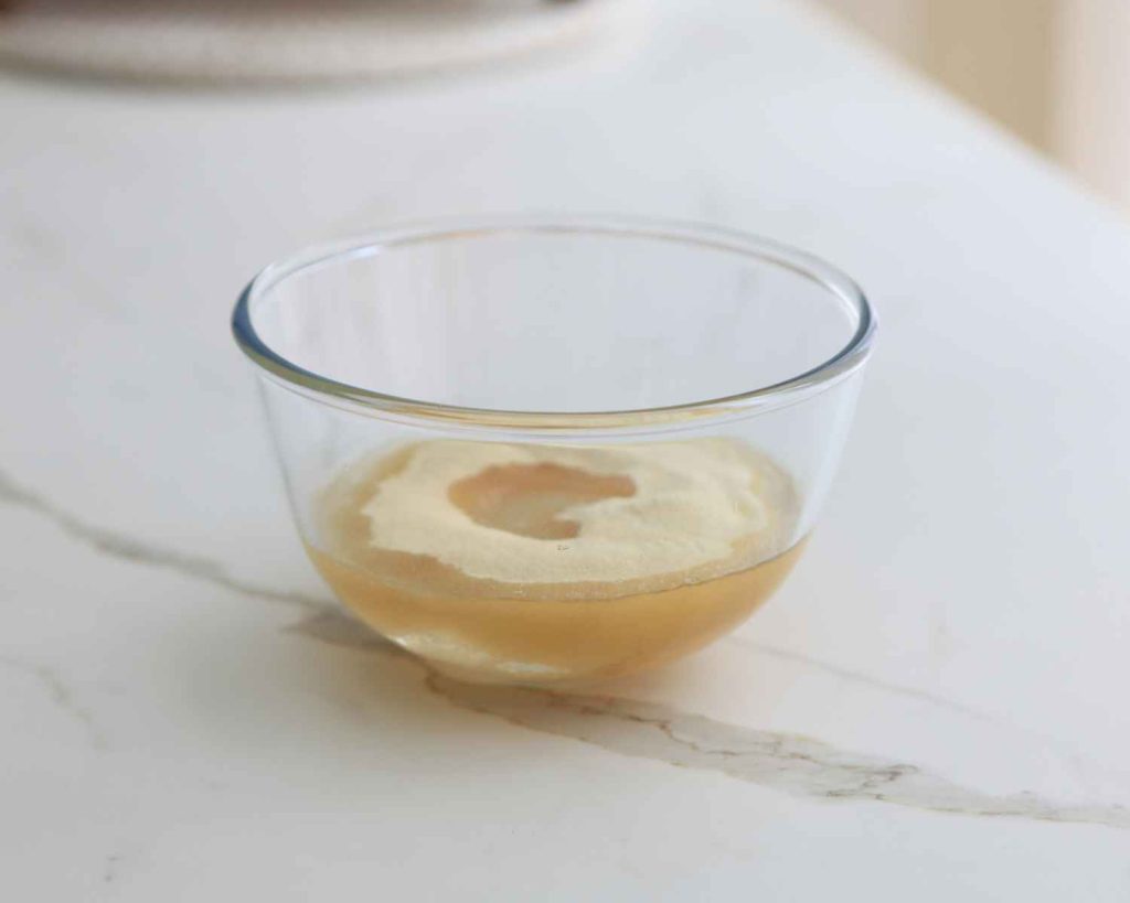 bowl of gelatine in water dissolving for the vanilla protein marshmallow recipe