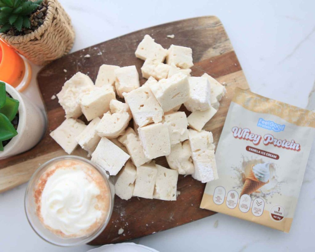 image of the vanilla protein marshmallow recipe all cut up into squares 