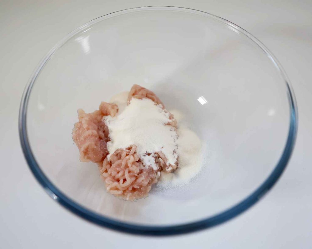 Viral dumpling bake minced chicken and tasteless protein in a bowl before mixing