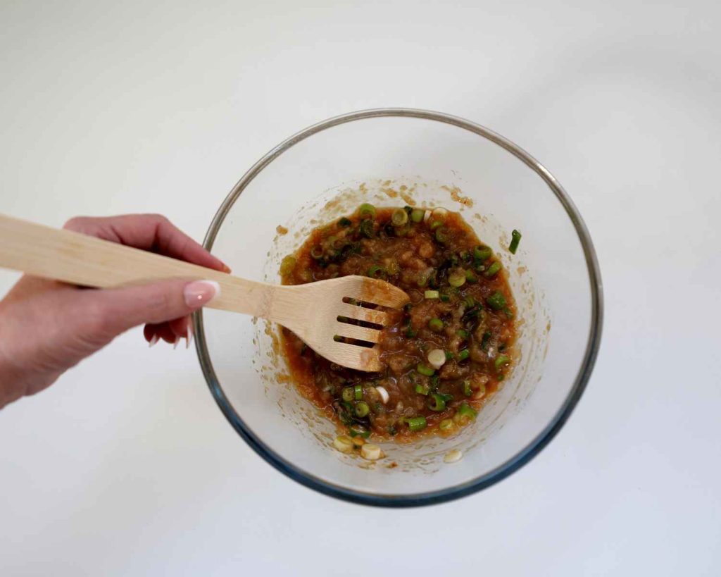 Combining the chicken mixture for the dumpling bake recipe