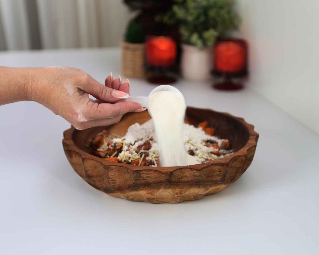 Adding tasteless protein by feel good collagen to the mixture for the BBQ Chicken & Sweet Potato Muffins