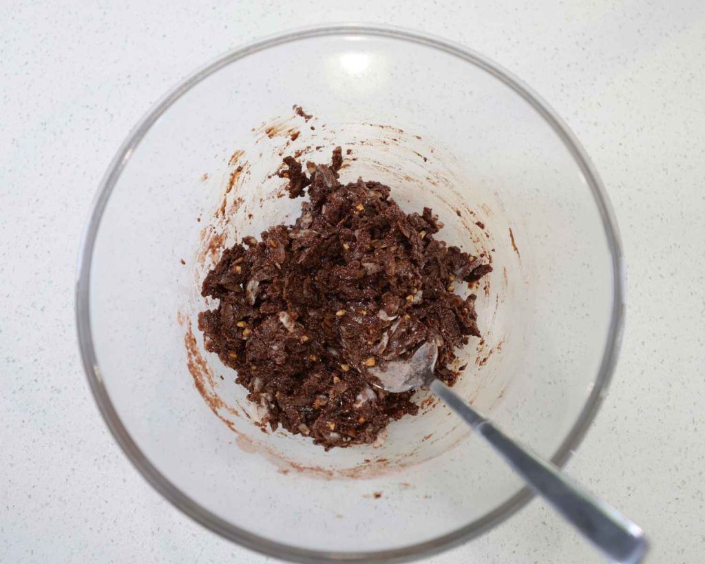 Chocolate Protein Easter Nests recipe ready to set in muffin tin