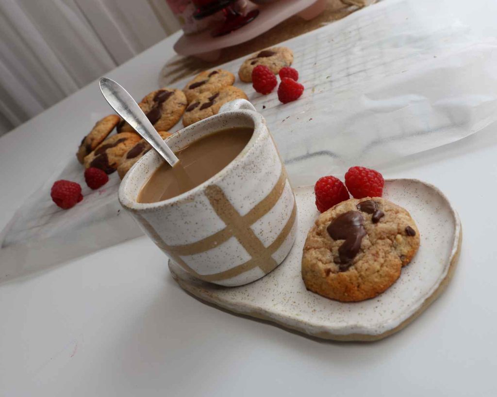 Chocolate Chunk Protein Cookies served with Feel Good Coffee and raspberries 
