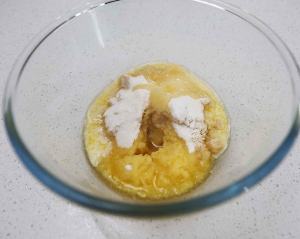 Wet ingredients added to the bowl for Mini Chocolate Protein Cheesecake recipe