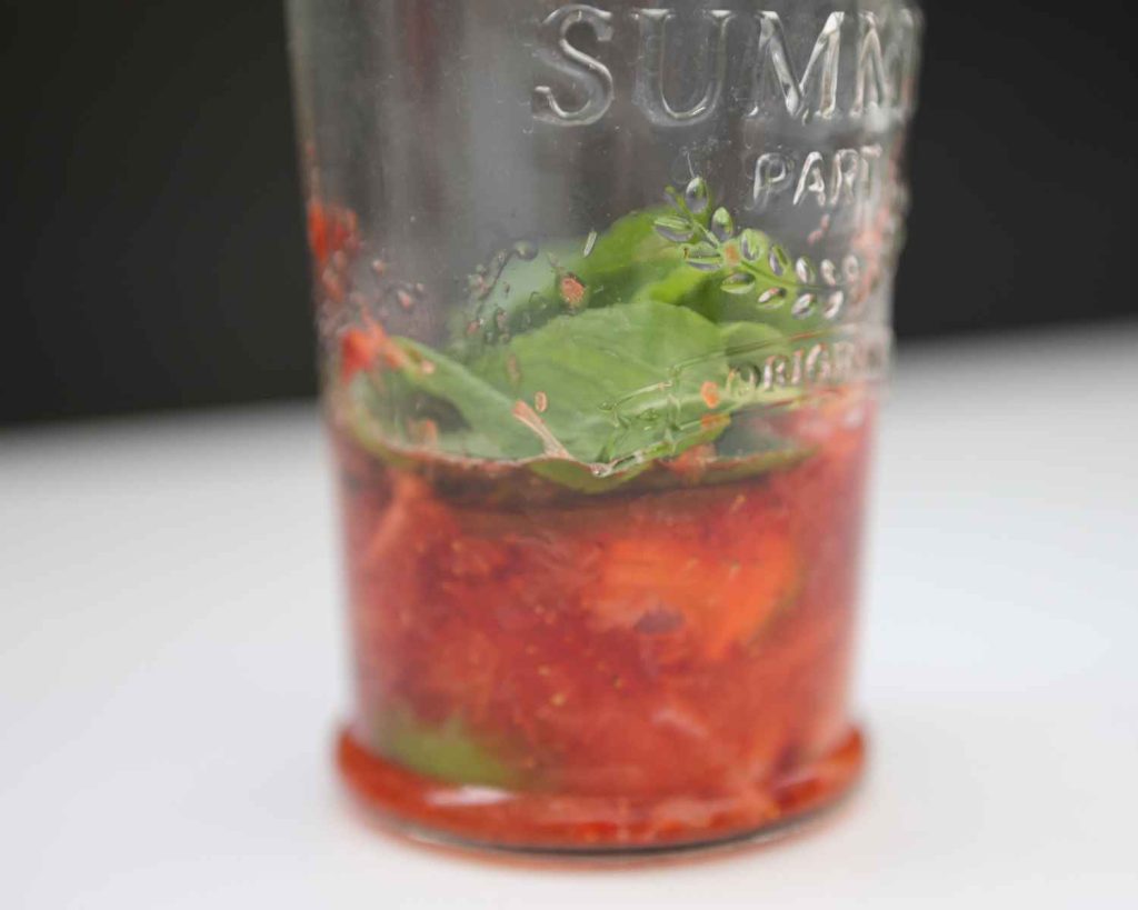 Adding mint leaves and lime juice to the recipe