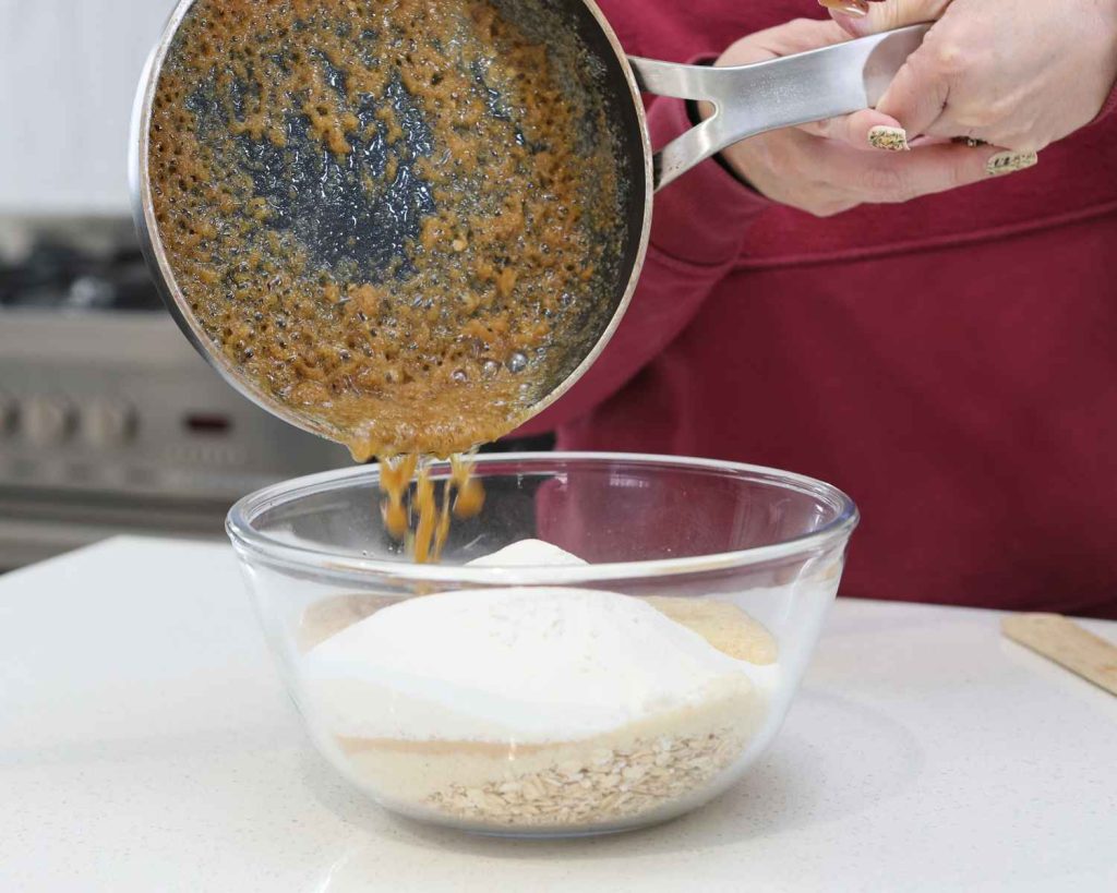 Mixing the wet ingredients into the dry ingredients