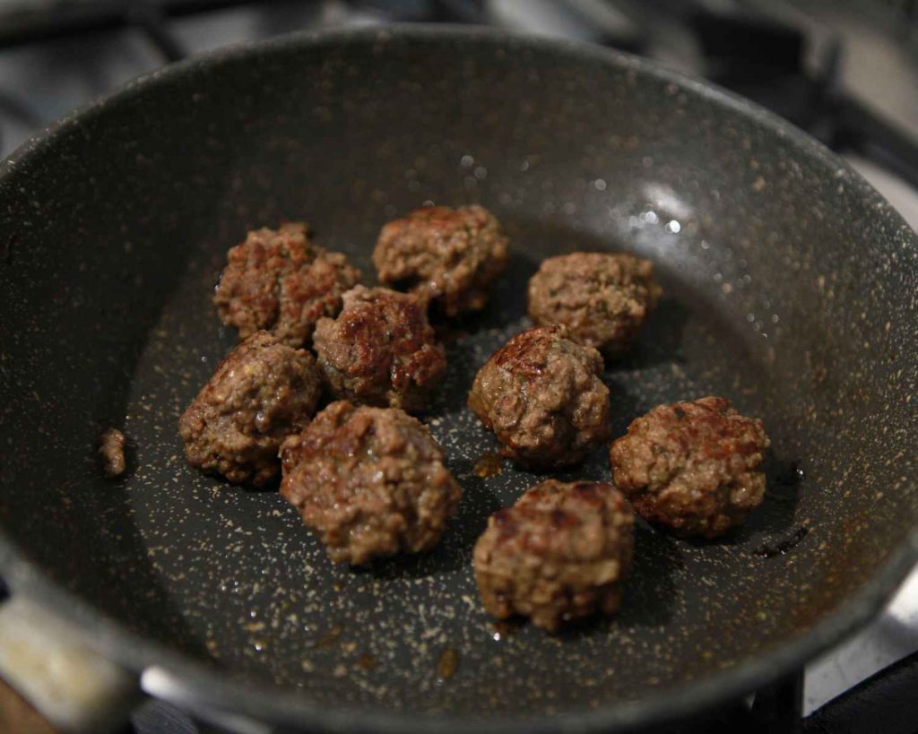 Cooked meatballs in a pan