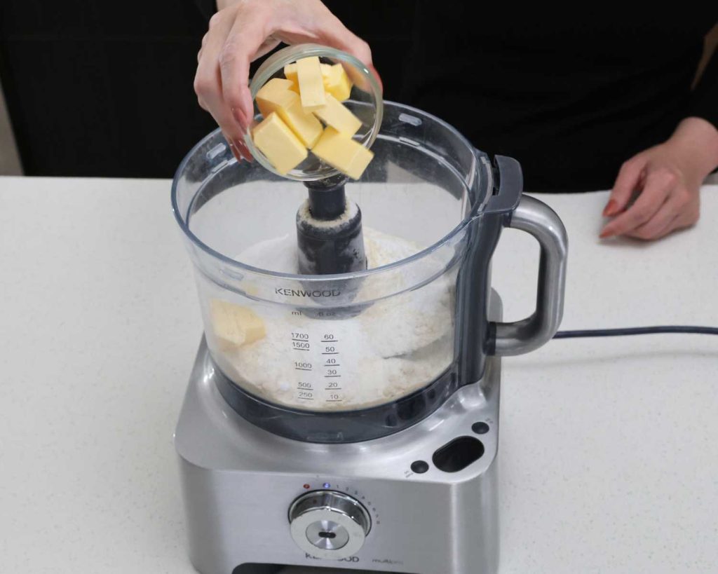 Adding butter to the pastry