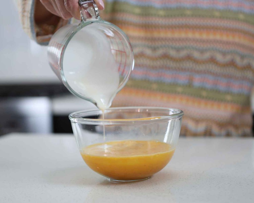 Adding light cream to the egg mixture